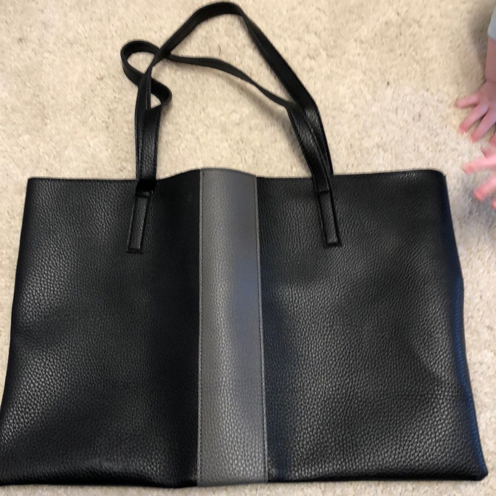 Black leather tote by Vince Camuto. Never used.